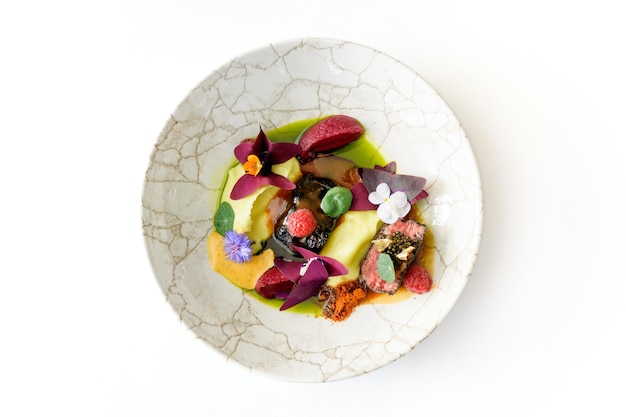 Plated gourmet meal on table